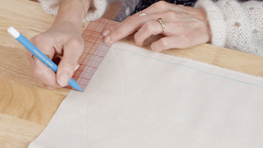 Diagram showing proper pocket placement on different garment lengths, with measurements from natural waist