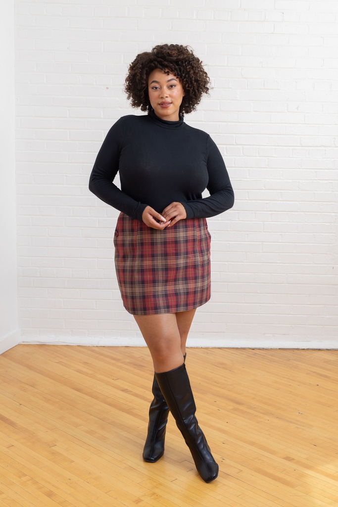 woman wearing checkered Orla mini skirt
