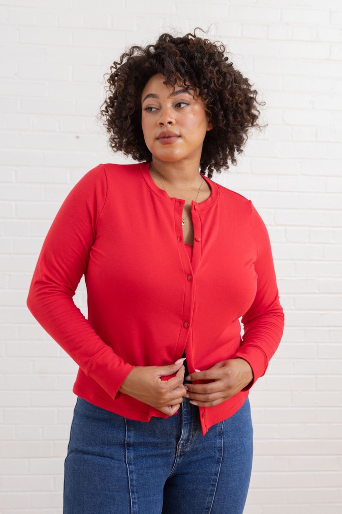 woman wearing red Fig cardigan