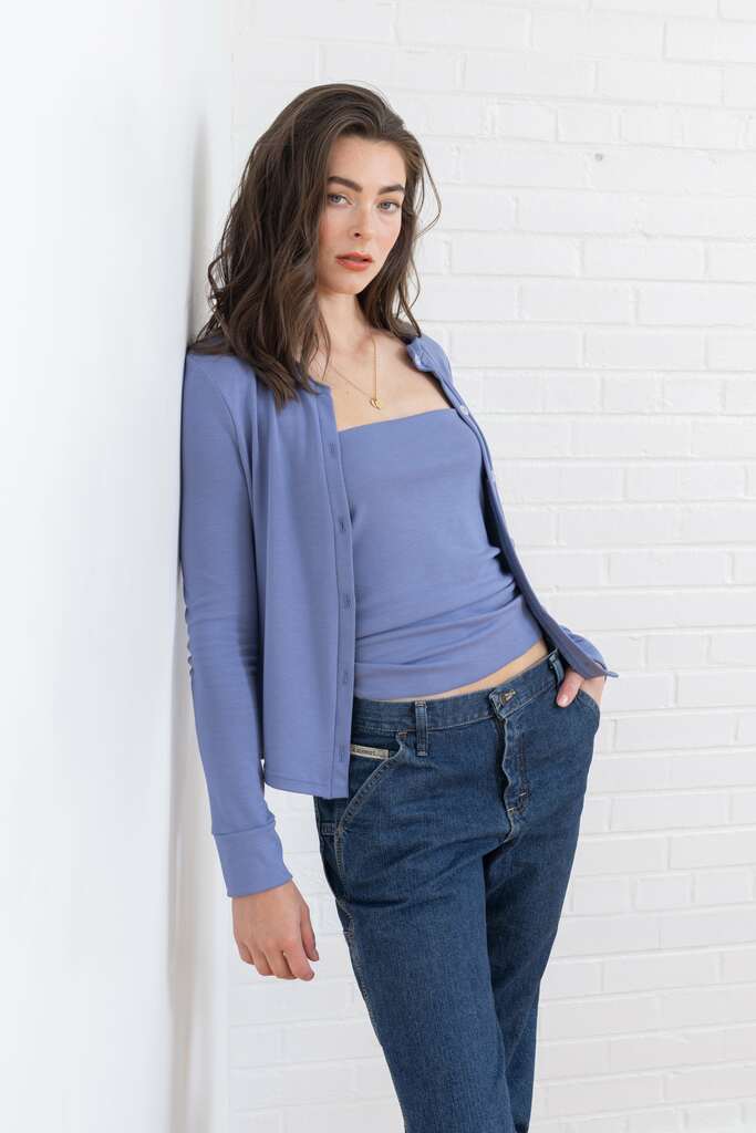woman modeling blue Fig cardigan
