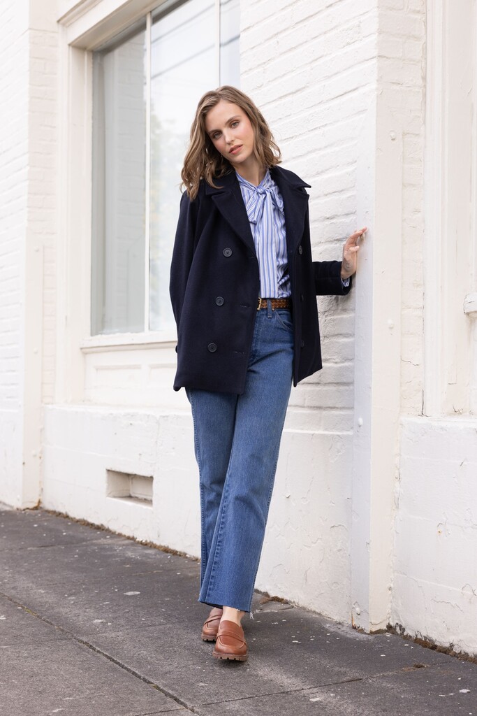 Woman modeling navy Maple peacoat