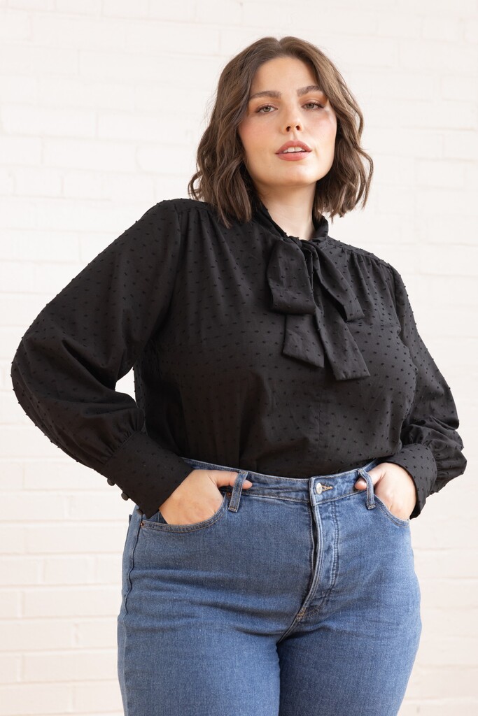 Model wearing striped Garnet blouse