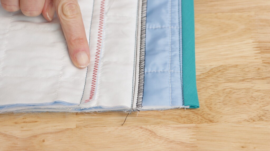 Comparison of finished vs. unfinished seam edges on quilted fabric
