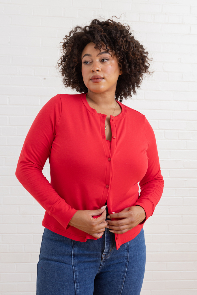 Woman modeling red Fig cardigan