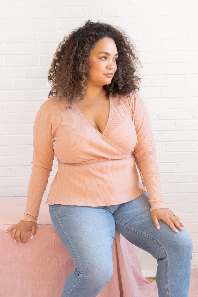 Woman modeling the Farah wrap top