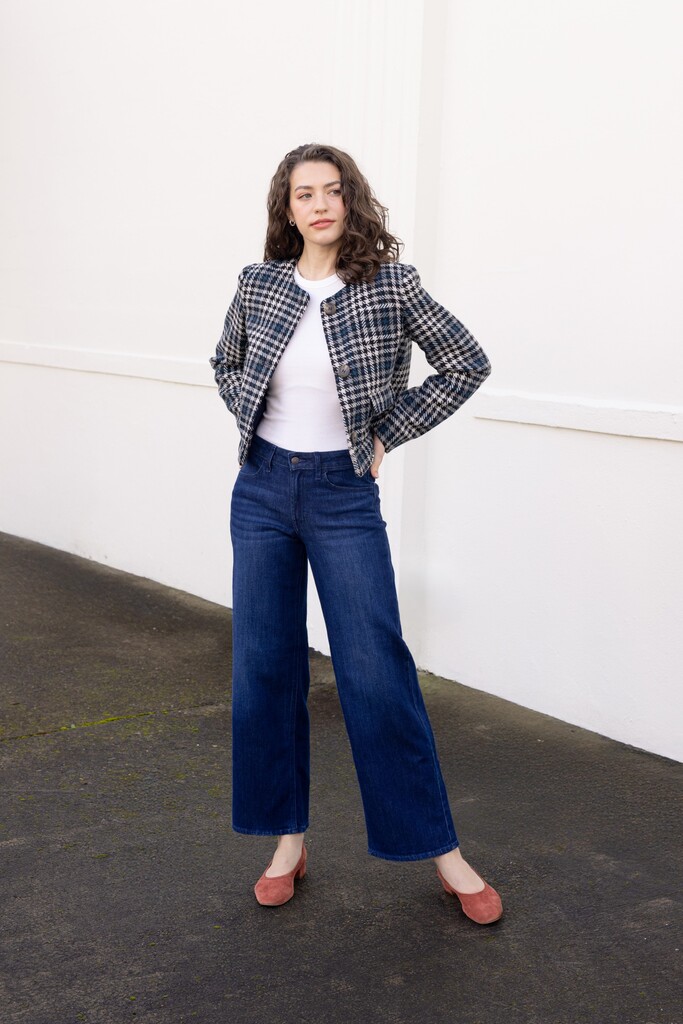 Woman modeling the checkered Rhoda jacket
