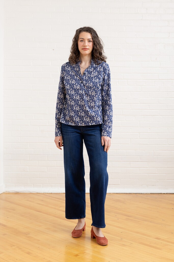 Woman modeling a floral Thyme shirt