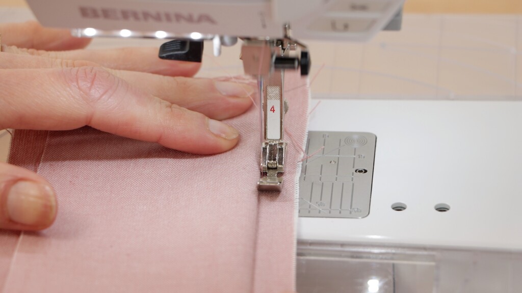 Close-up comparison showing regular foot vs zipper foot