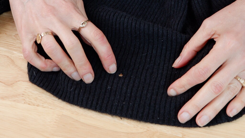 Before and after shots of fabric with hole being repaired using darning foot