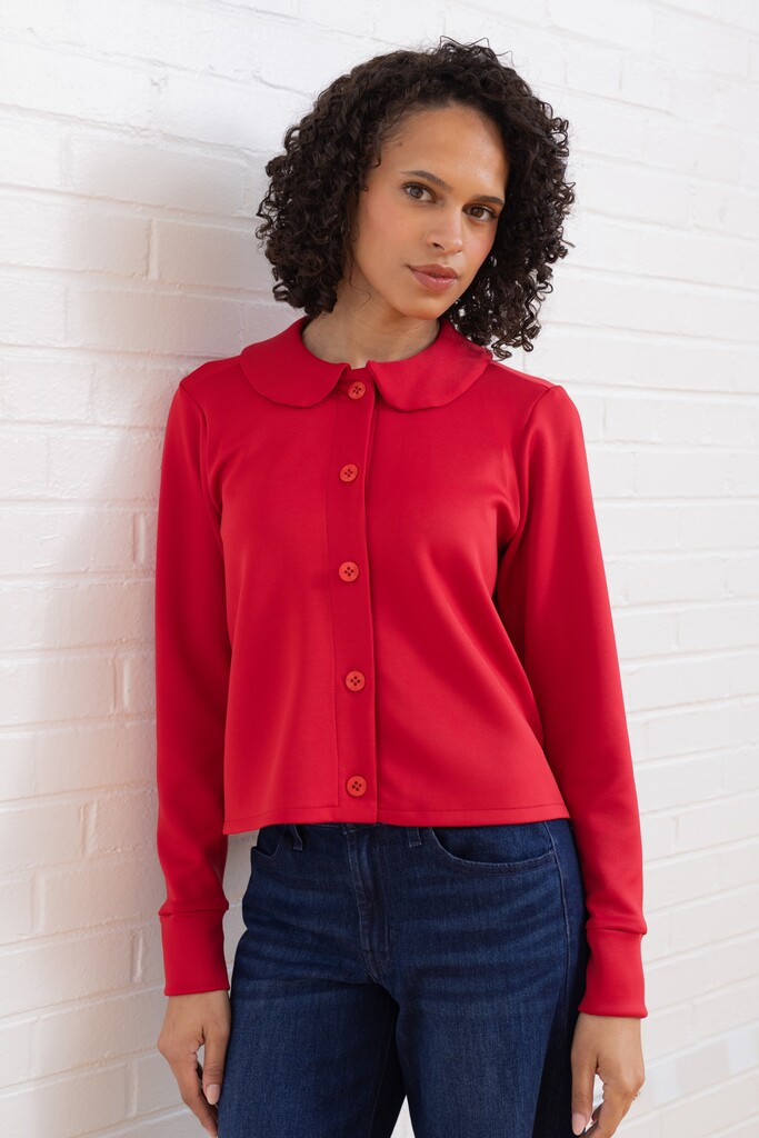 Woman modeling red Thistle cardigan