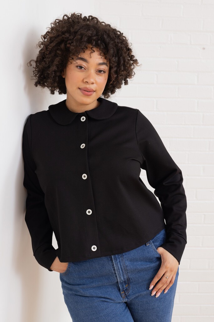 Woman modeling black Thistle cardigan
