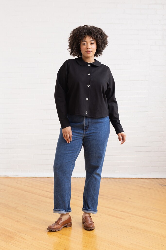 Model wearing black Thistle cardigan