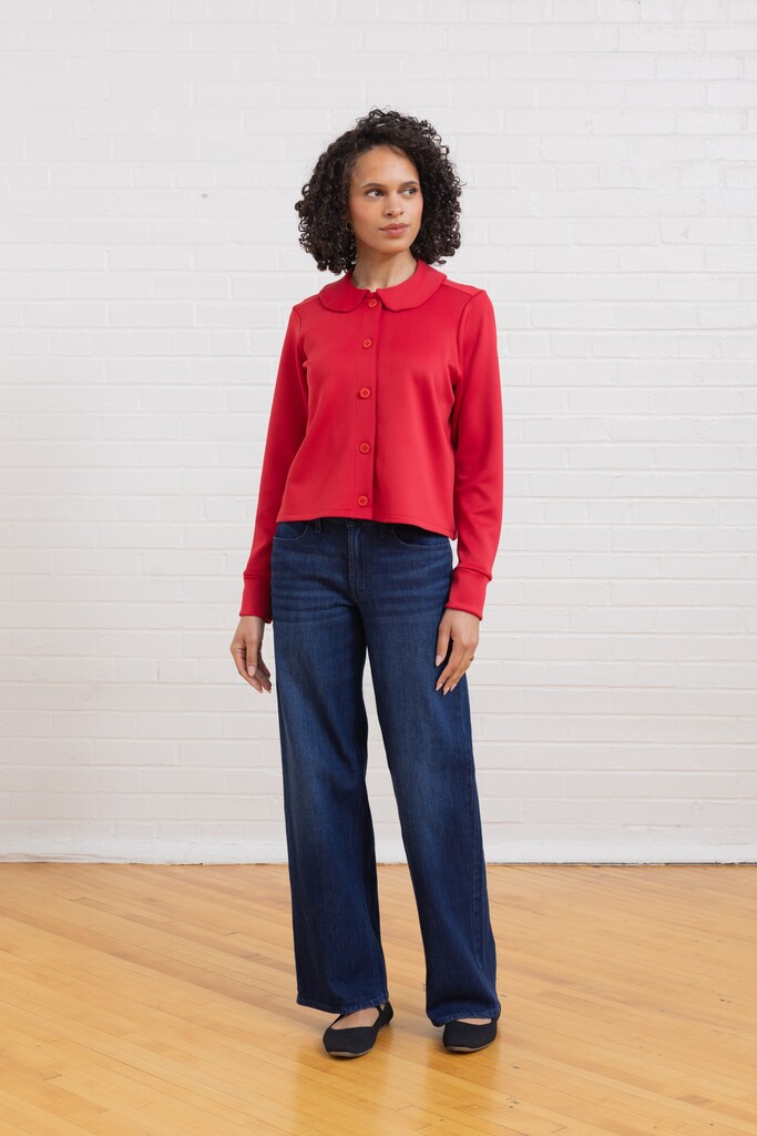 Model wearing red Thistle cardigan