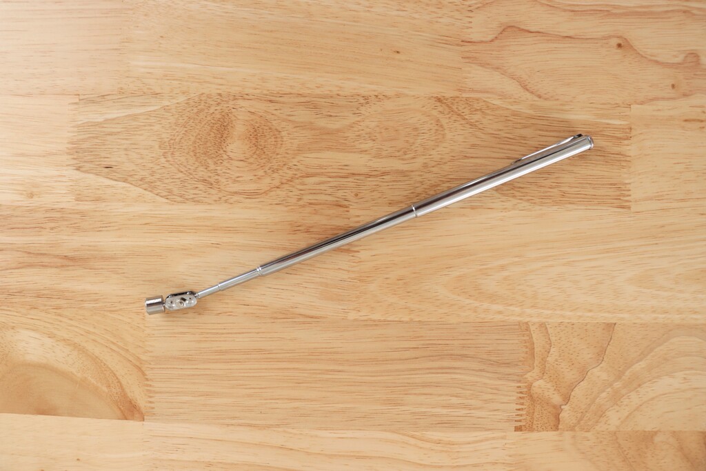 Telescoping magnetic tool extended to full length