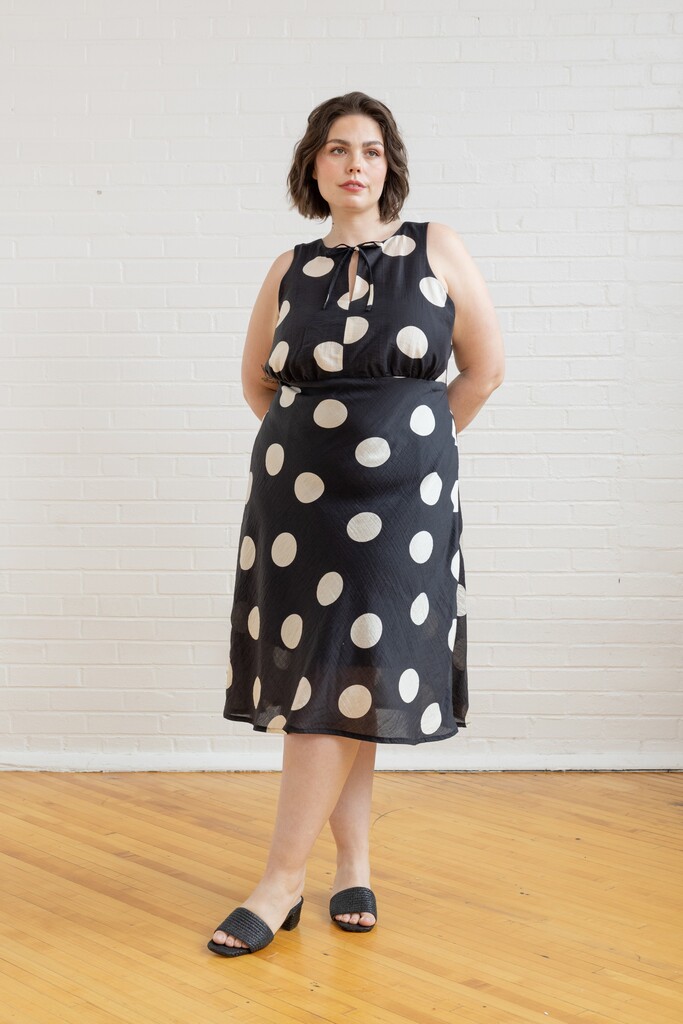 Model wearing polkadot Freesia dress