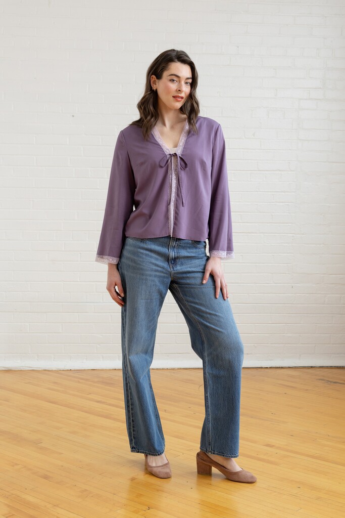 Model wearing a violet Orchid bed jacket