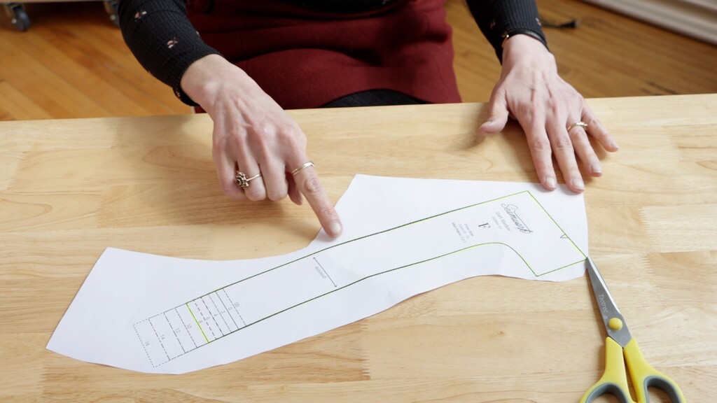 neatly separated individual pattern pieces laid out on a cutting table