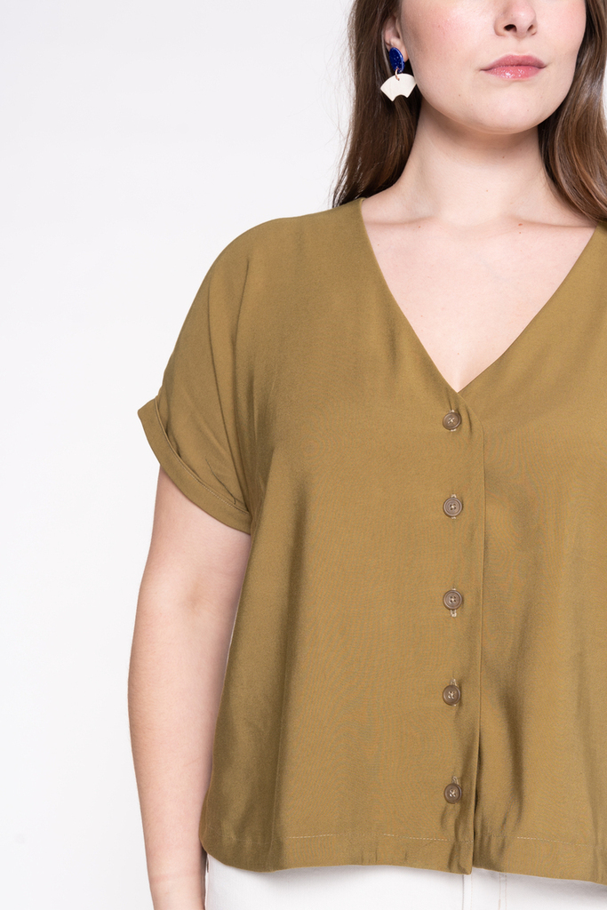 Close-up of Marlow's faced V-neckline and button placket