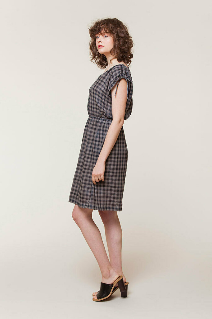 Side view of Kimmy dress showing the dolman sleeve drape