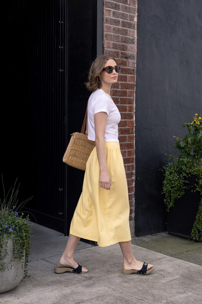 Woman modeling yellow Elowen skirt