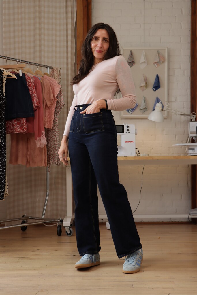 The Alice tee in pale pink merino rib, styled with dark denim and a vintage silk scarf