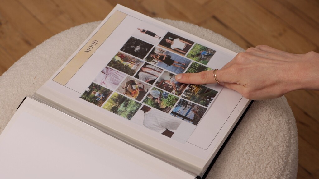 Sarai's open sewing journal or planner, showing a moodboard spread with images of gardening, outdoor life, and black and white color references