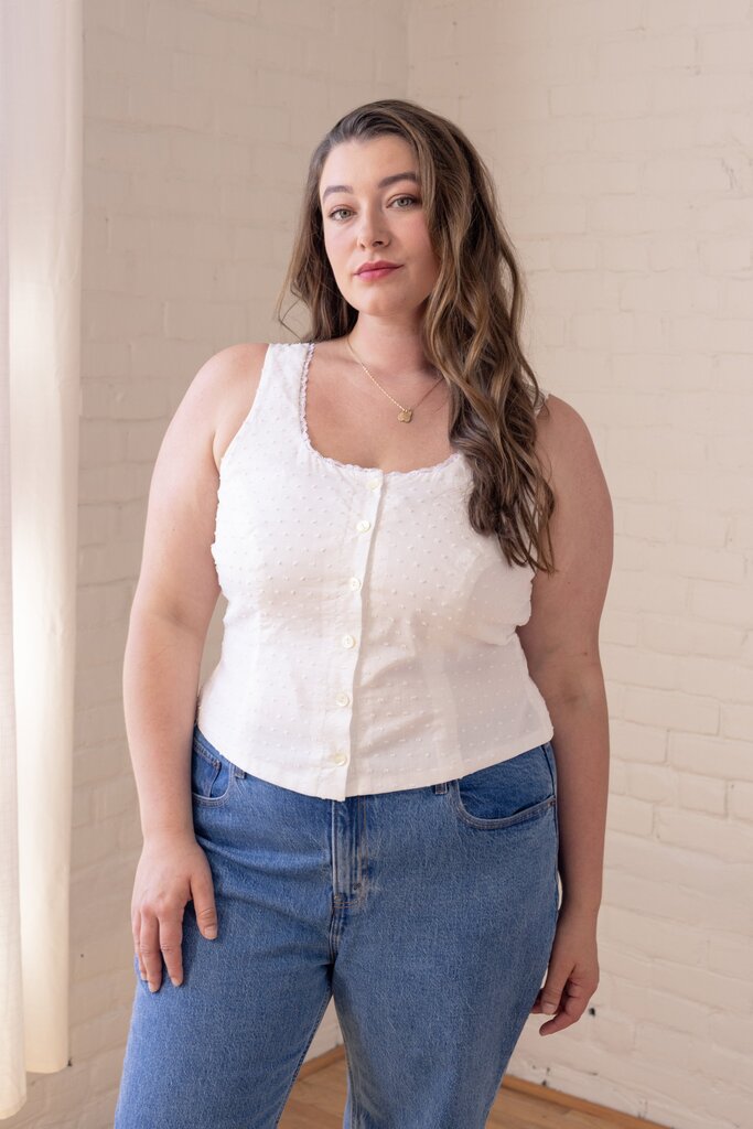 Model wearing white Cassis top, detail view