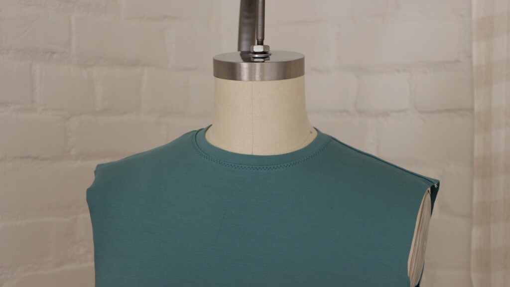 neckband cut shorter (lying flat and smooth)