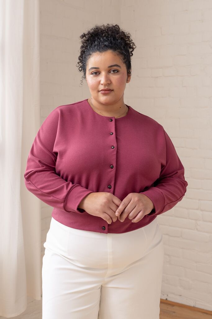 Model wearing a pink Opal cardigan