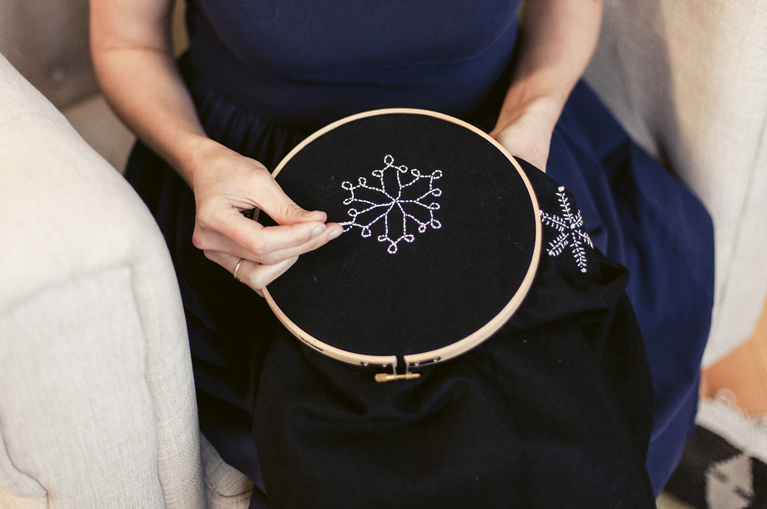 embroidering a snowflake