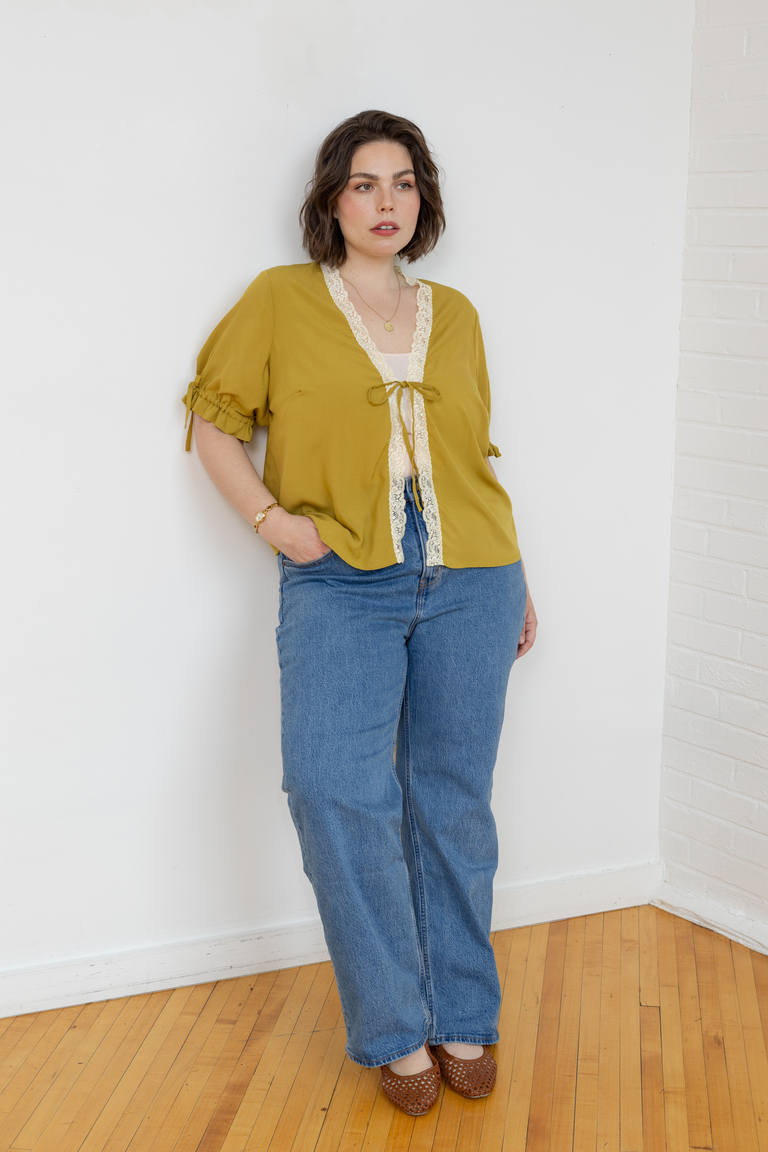 The Orchid Puff Sleeve Tie Front Top sewing pattern, from Seamwork