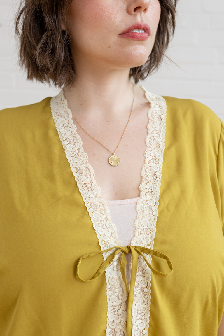 The Orchid Puff Sleeve Tie Front Top sewing pattern, from Seamwork